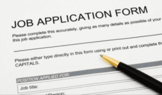 Picture of a job application form and pen