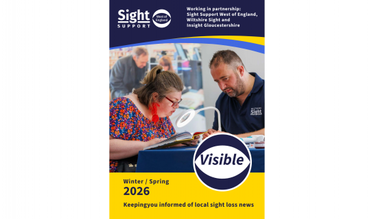 Front cover of the Visible magazine, Winter / Spring 2026. A partially sighted woman is reading a book using a magnifying lamp, supported by a member of staff wearing a Wiltshire Sight top. The Visible logo appears on the cover, along with the text “Working in partnership: Sight Support West of England, Wiltshire Sight and Insight Gloucestershire” and “Keeping you informed of local sight loss news”.