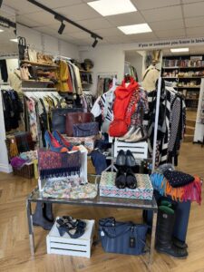 A colourful display of pre-loved clothing, shoes, handbags and accessories inside the new Marlborough shop